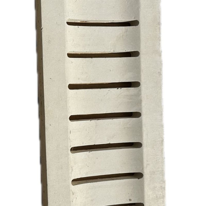 Caniveau percé en pierre