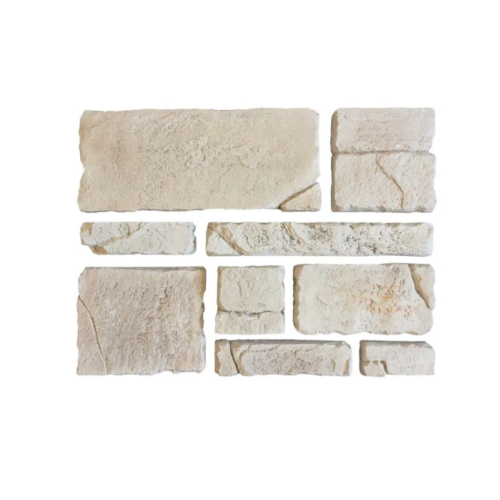 parement de pierre olympe posé sur un muret extérieur proche d'une piscine