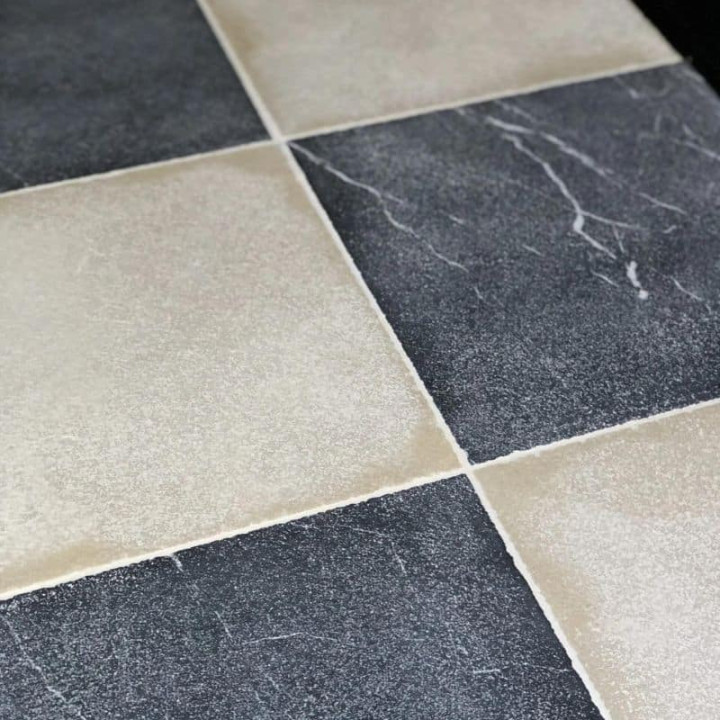 Dallage à damier en pierre bleue et pierre calcaire