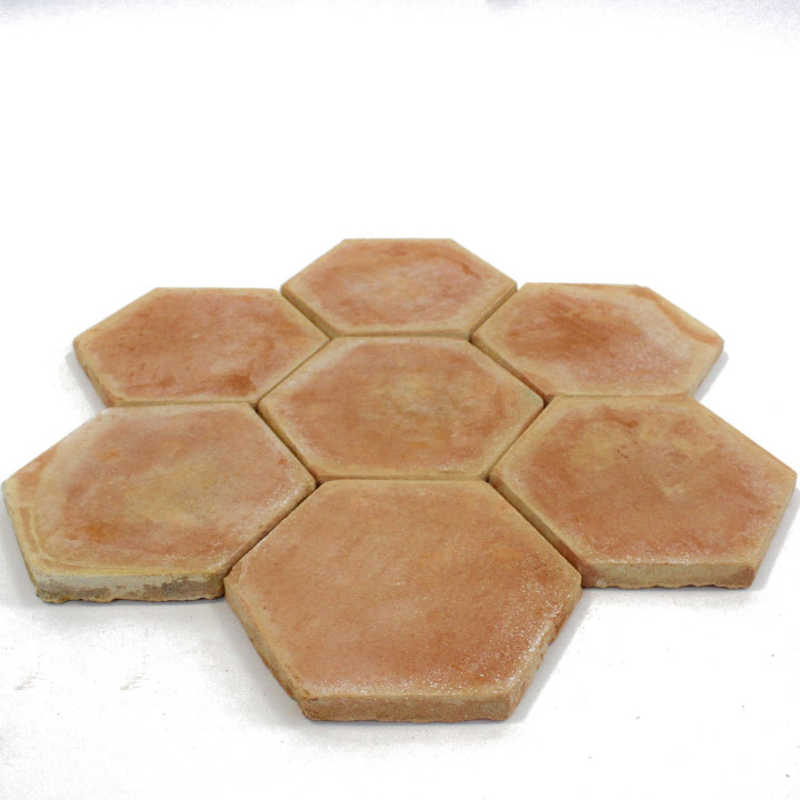 Tomette hexagonale paillée rosée