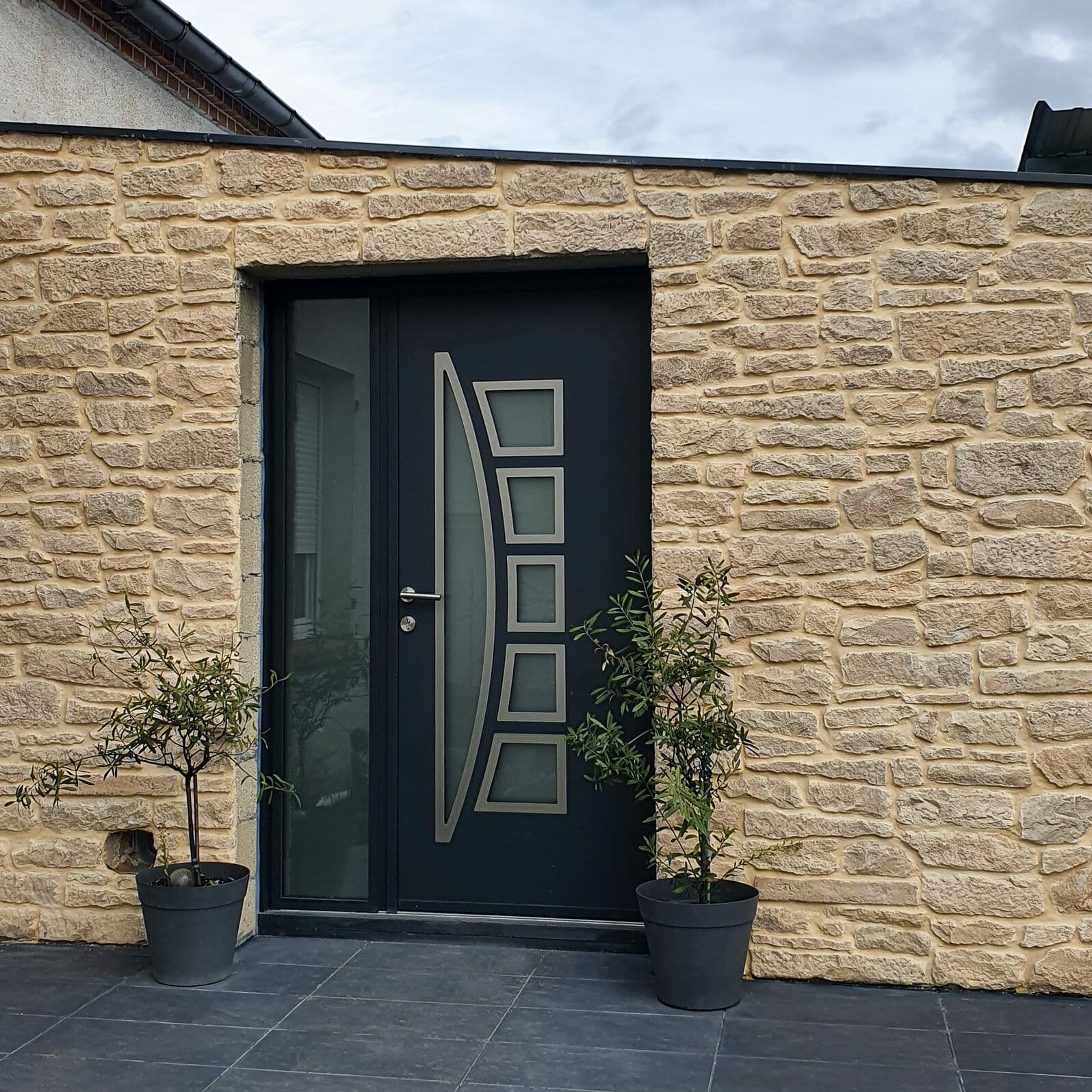 Réalisation d'un mur en Parement de pierre Clermont