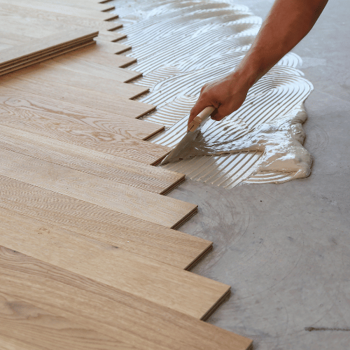 Pose de parquet contrecollé sur carrelage : les techniques